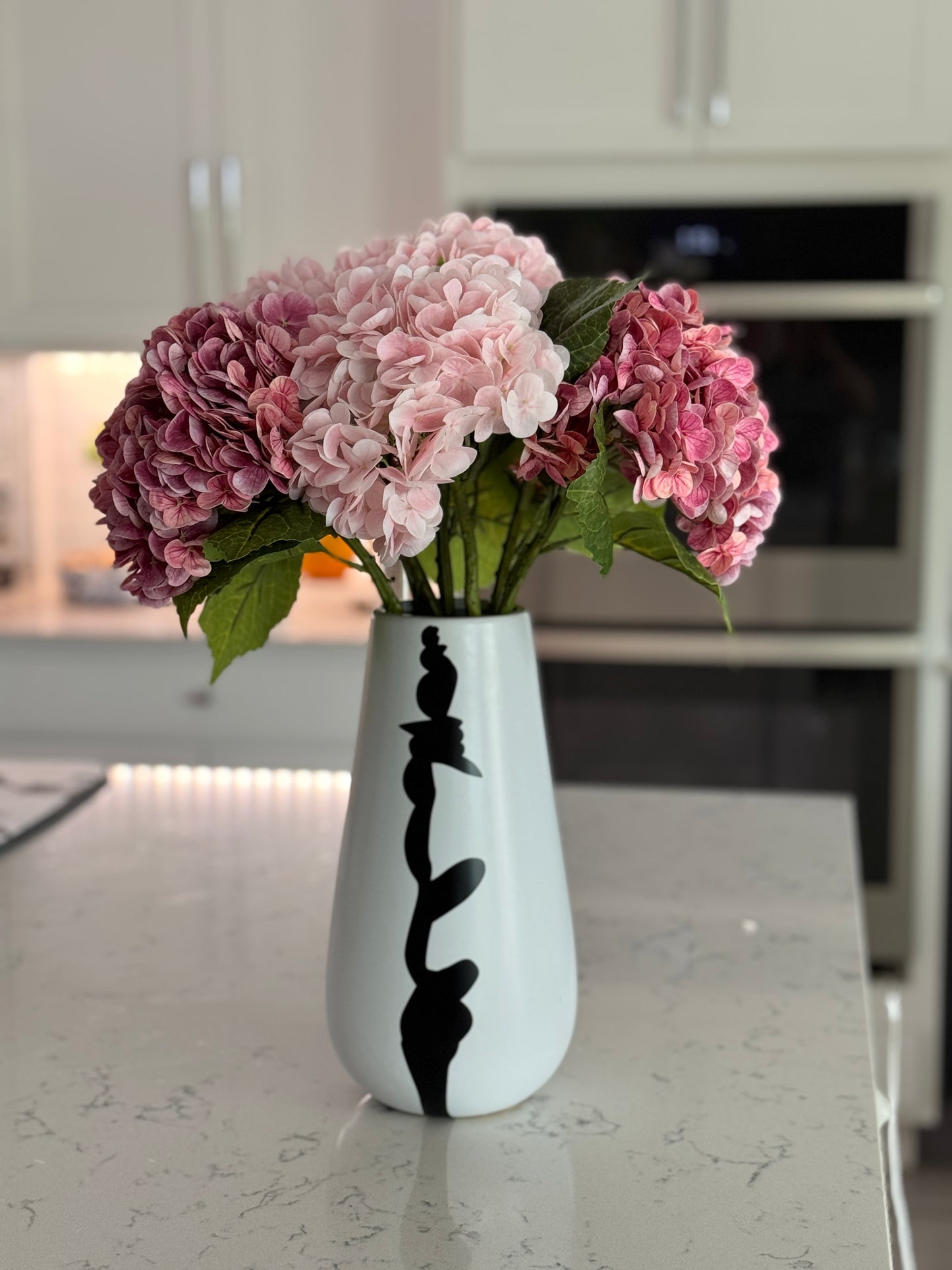 Black white accent vase
Modern vase for entryway
Compact black and white vase
Artistic minimalist vase
Ceramic vases for modern homes
Home styling vase
Designer home decor vase
Vase for dried stems
Small ceramic flower vase
Decorative accent vase