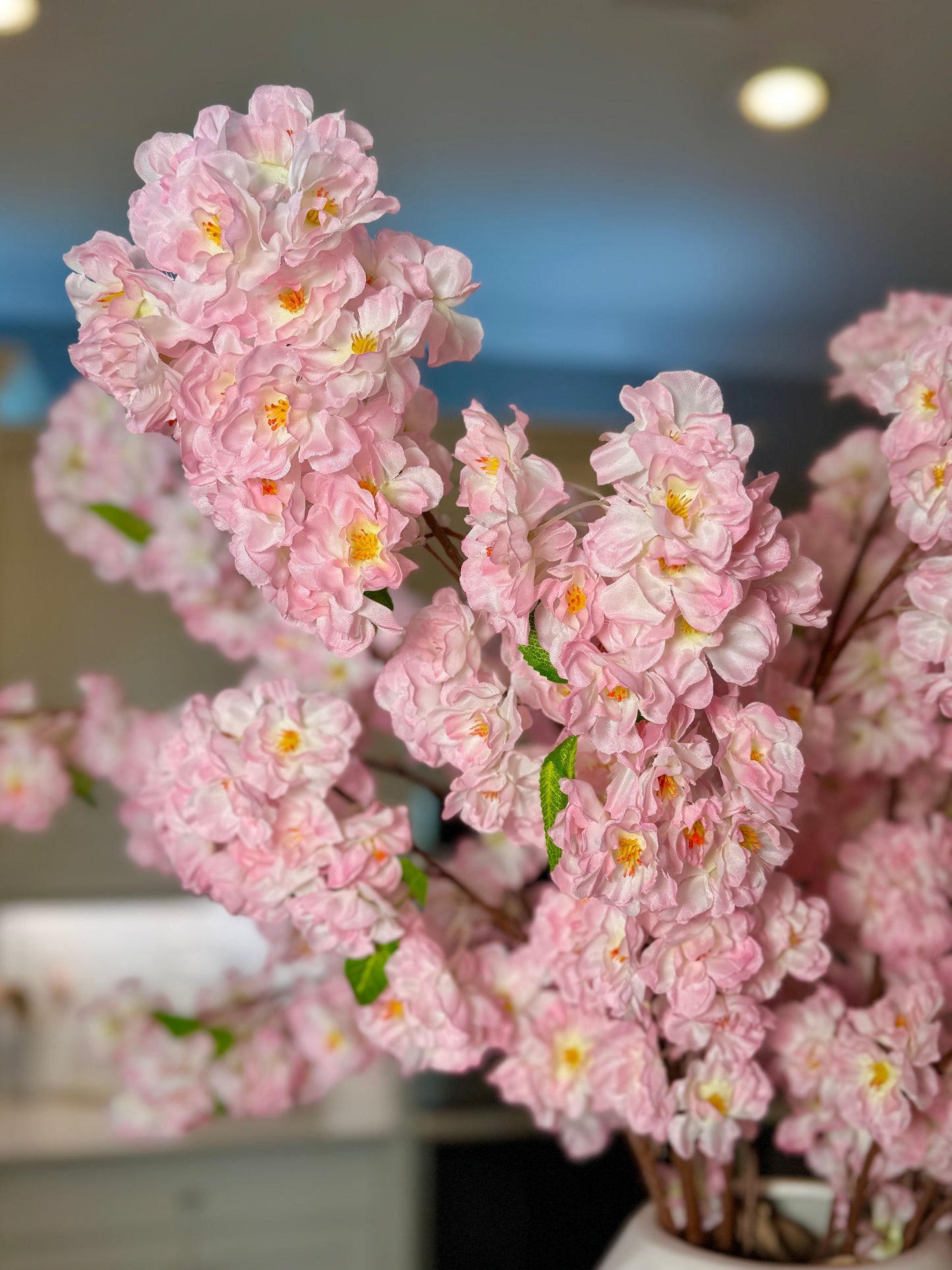 office decor artificial branches
spring home decor branches
baby shower pink decorations
event decor cherry blossoms
vase filler branches
lush floral arrangement
decorative branches for living room
bedroom decor pink flowers
everlasting cherry blossoms
low maintenance floral decor