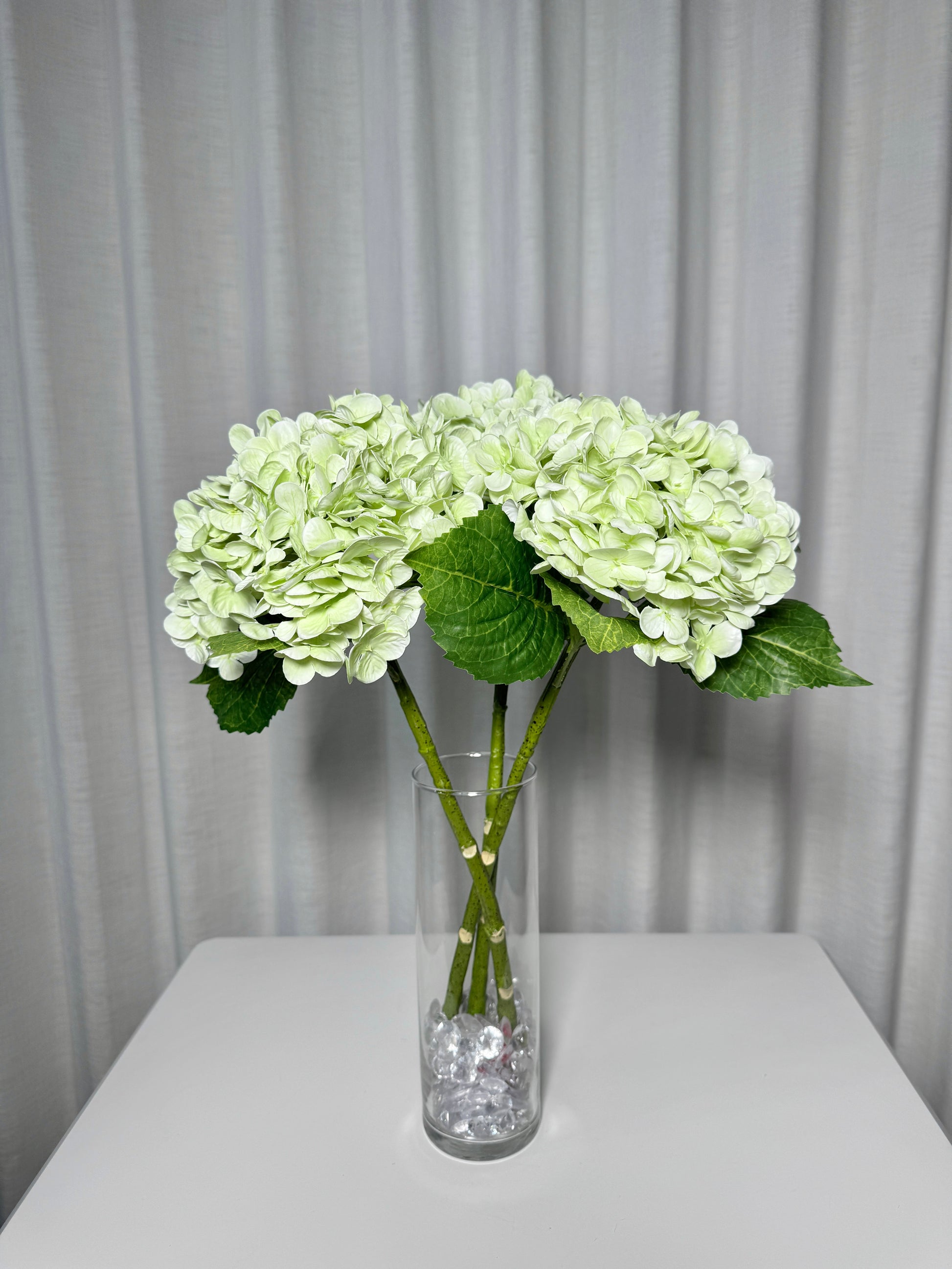 artificial green hydrangea
faux green hydrangea
real touch hydrangea stems
lifelike artificial flowers
20 inch hydrangea stems
green hydrangea bouquet
faux hydrangea set of 3
fake hydrangea wedding flowers
realistic faux hydrangeas
artificial hydrangea centerpieces