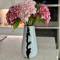 Black and white modern vase

Cleo black and white vase

11 inch modern vase

Medium decorative vase

Black and white ceramic vase

Contemporary Cleo vase

Monochrome home decor vase

Stylish modern table vase

Designer black and white vase

Cleo medium vase