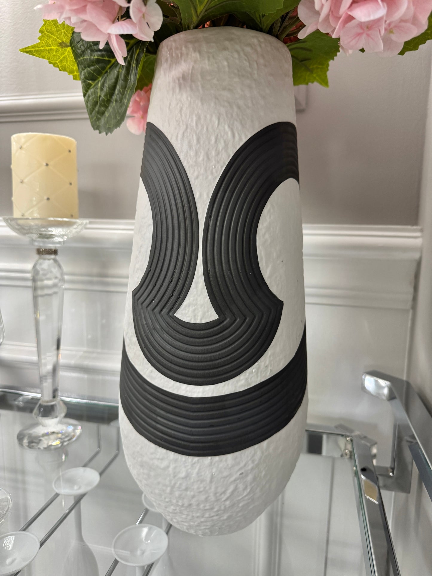 Black white sculptural vase

17 inch home accent vase

Shelf styling ceramic vase

Modern artistic vase

Statement piece vase

Neutral tone ceramic vase

Vase for faux flowers modern

Modern interior accent piece

Black and white minimalist décor

Luxury ceramic decorative vase