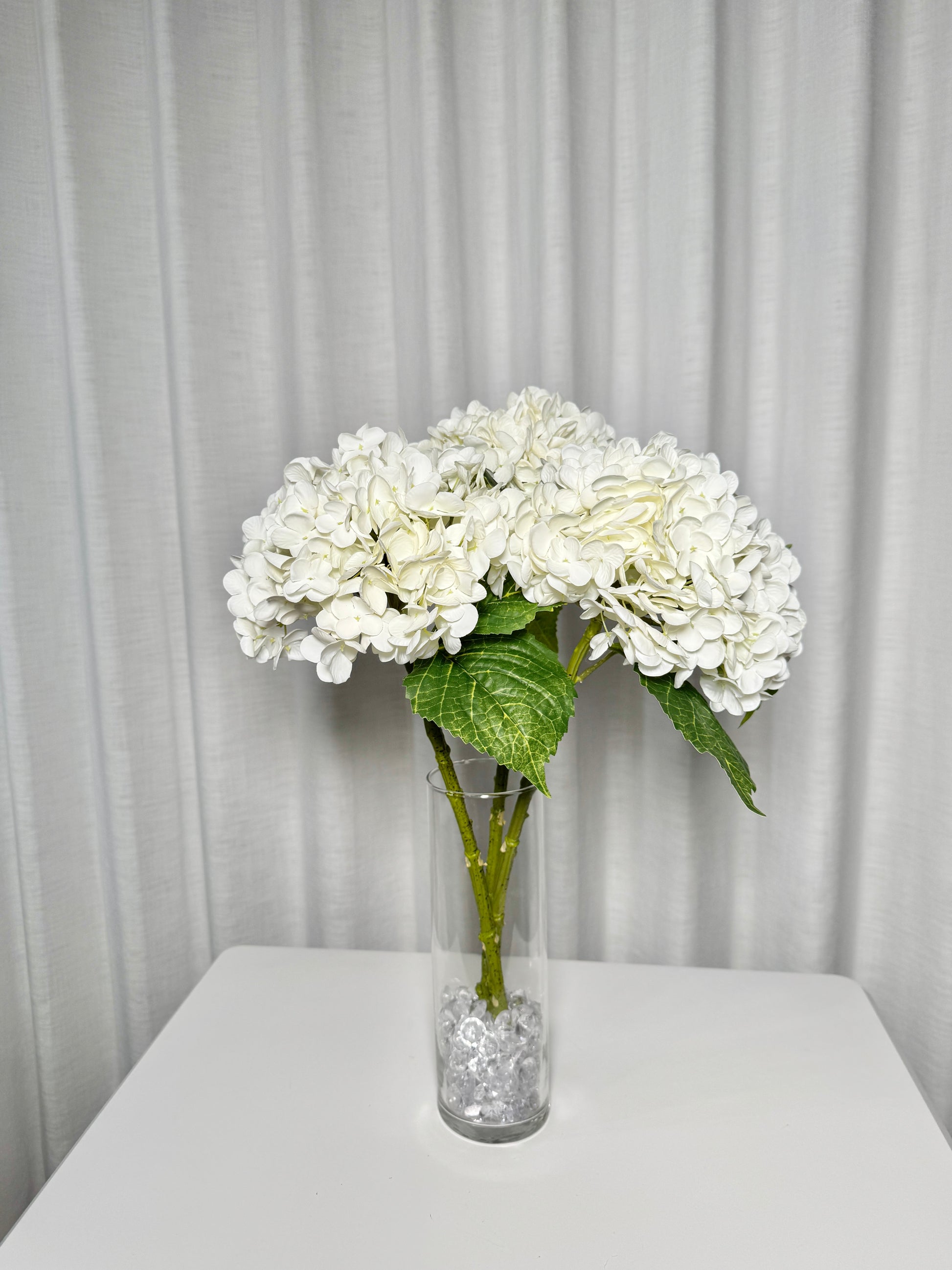artificial white hydrangea flowers

faux white hydrangea stems

real touch white hydrangeas

silk white hydrangea bouquet

lifelike artificial hydrangeas

20 inch hydrangea stems

white hydrangea flower bundle

realistic faux hydrangea

artificial hydrangea 3-piece set

real touch silk hydrangeas