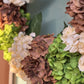 All season front door wreath

Spring summer hydrangea wreath

Autumn neutral wreath

Neutral fall door decor

Multi-season flower wreath

Soft tone seasonal wreath

Hydrangea wreath for all seasons

Timeless floral wreath

Earth tone wreath decor

Wreath for every season