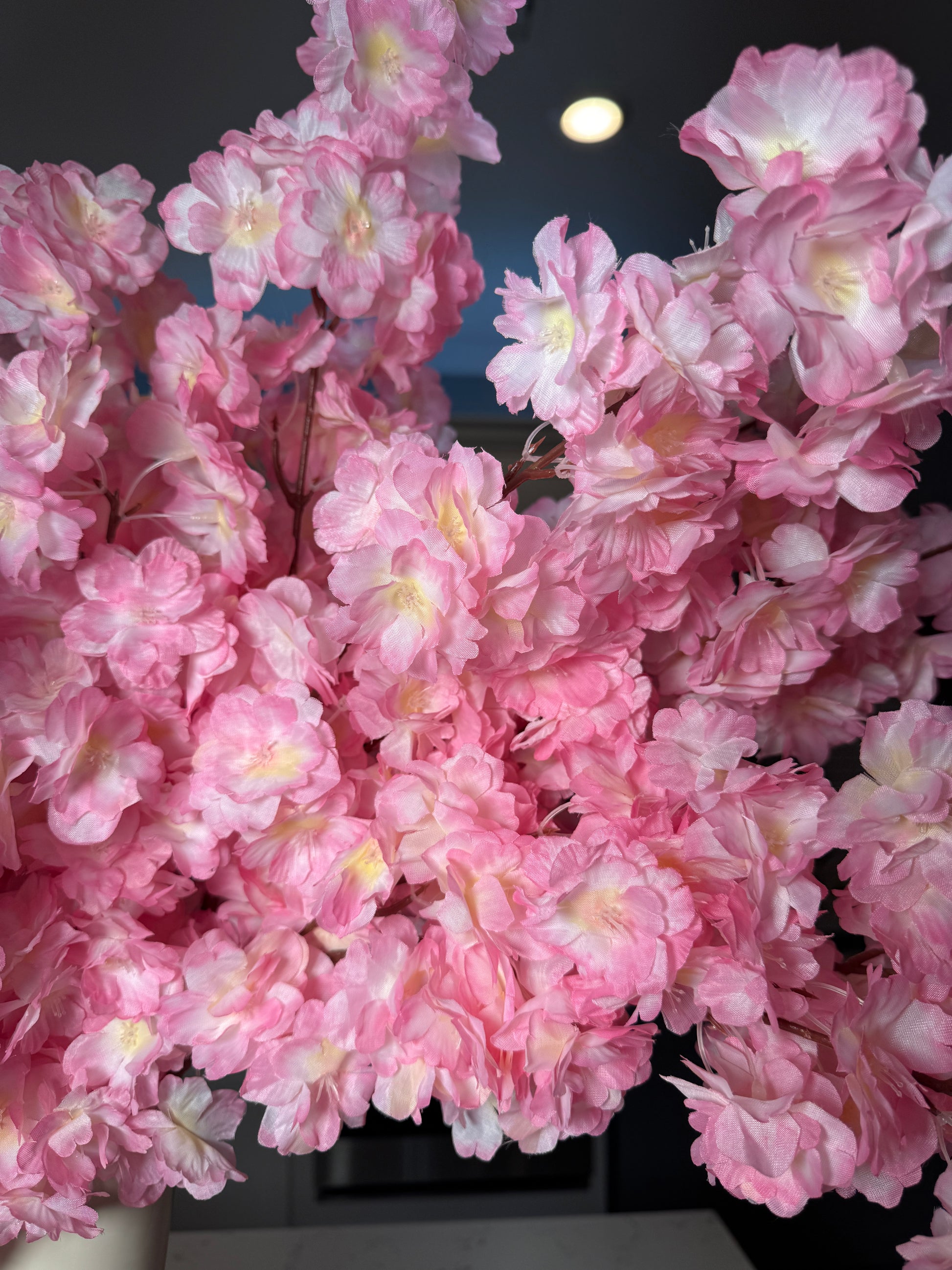 artificial cherry blossom home decor

spring home decoration branches

pink faux flowers for vase

tall silk flowers for living room

floral decor cherry blossom style

Japanese inspired home decor

pink cherry blossom wall decor

modern artificial floral arrangements

faux spring branches decor

tall artificial flower stems